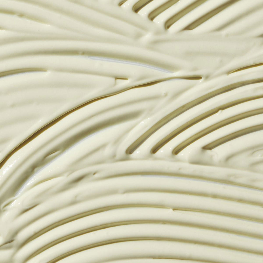 Close-up of beige ceramic tiles with wavy pattern