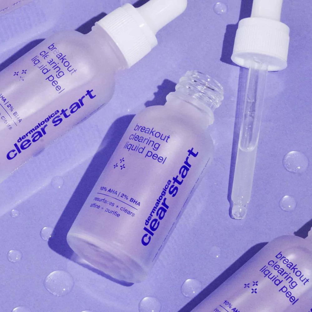 Dermatologist Clear Start breakout clearing liquid peel bottles on a purple background