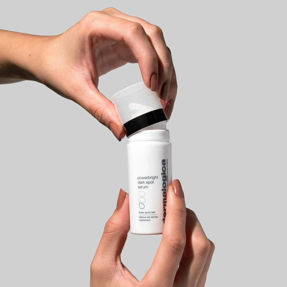 Person holding a powerbright dark spot serum